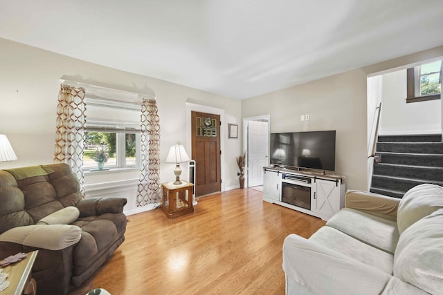 living room featuring light wood-type flooring