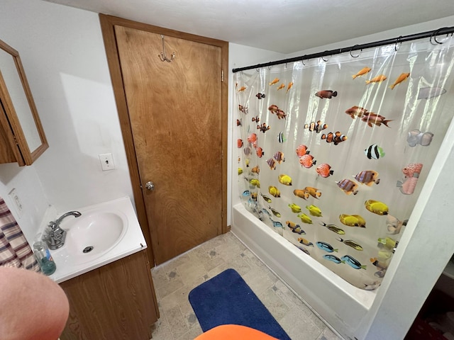 bathroom with shower / bath combo, vanity, and tile patterned flooring