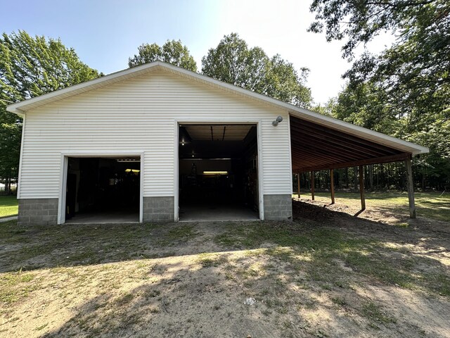 garage with a carport