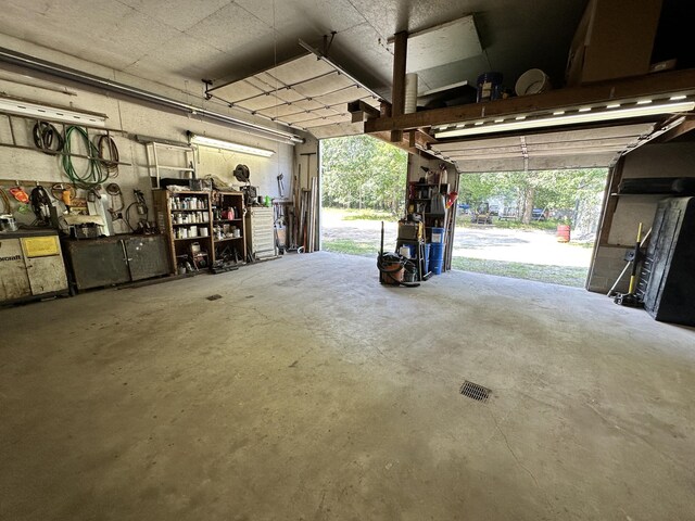 garage featuring a workshop area