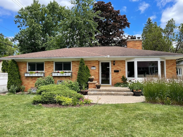 ranch-style house with a front yard