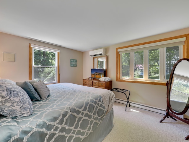 bedroom featuring a wall mounted AC, a baseboard heating unit, and carpet flooring