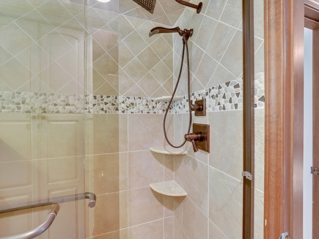 bathroom with an enclosed shower