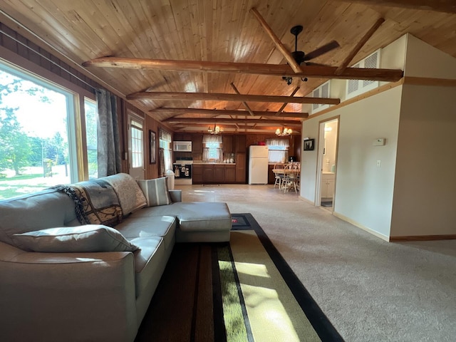 unfurnished living room with lofted ceiling with beams, ceiling fan with notable chandelier, light colored carpet, and wood ceiling