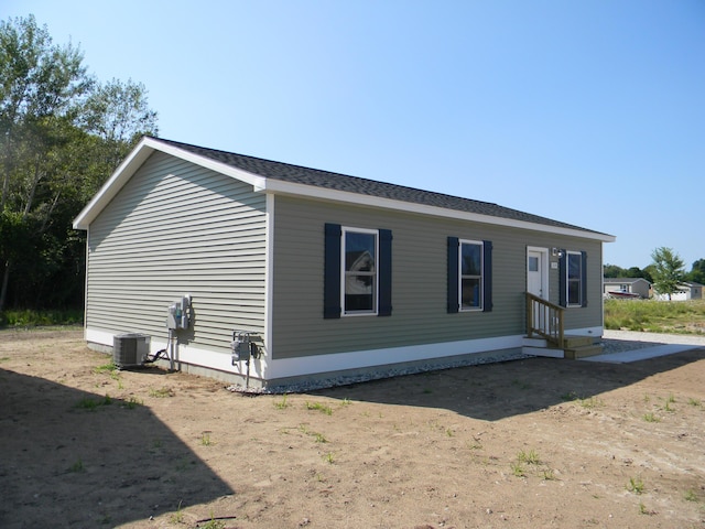 view of home's exterior featuring central air condition unit