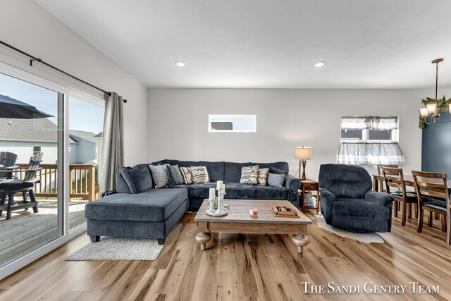 living room featuring light hardwood / wood-style flooring and plenty of natural light