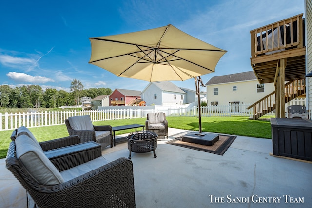 view of patio / terrace featuring an outdoor living space with a fire pit