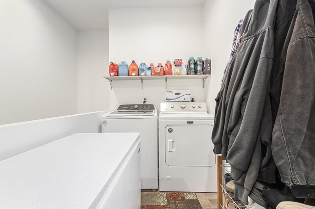 washroom featuring light wood-type flooring and washer and dryer