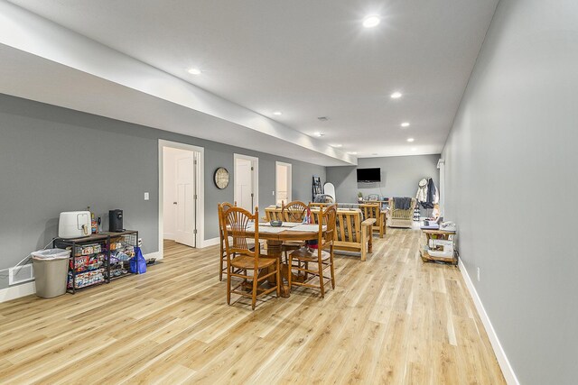 dining space featuring light hardwood / wood-style flooring