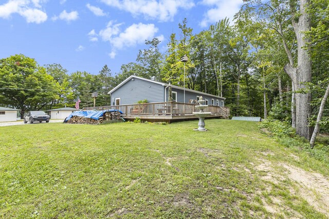 view of yard featuring a deck