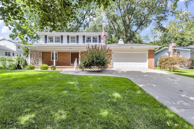 view of front of home with a porch, a garage, brick siding, concrete driveway, and a front yard