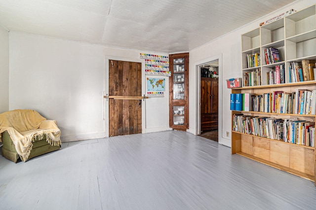 living area with wood-type flooring