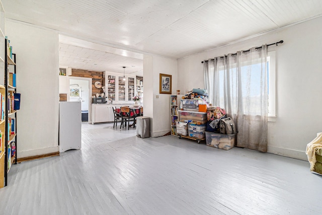 miscellaneous room with light wood-type flooring