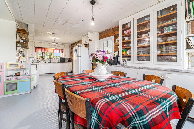 dining room featuring sink