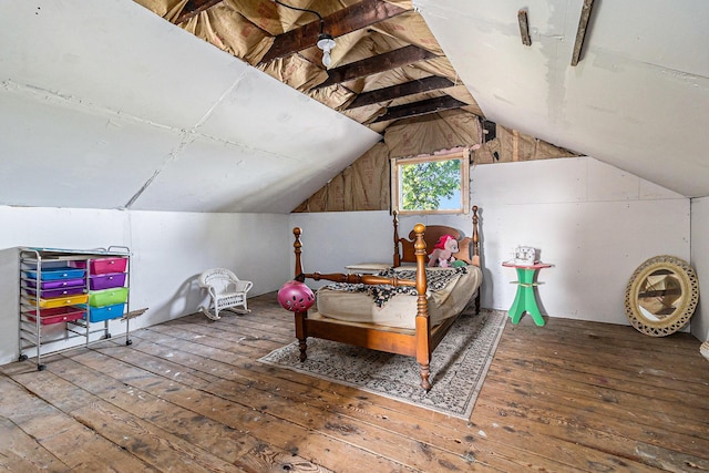 bedroom with wood-type flooring and lofted ceiling