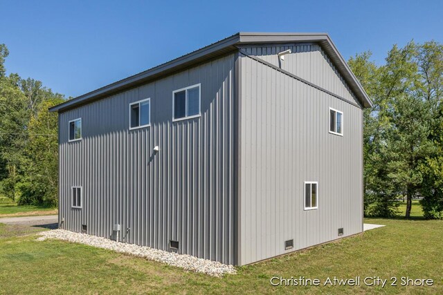 view of property exterior featuring a yard