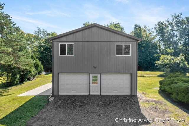 garage with a lawn