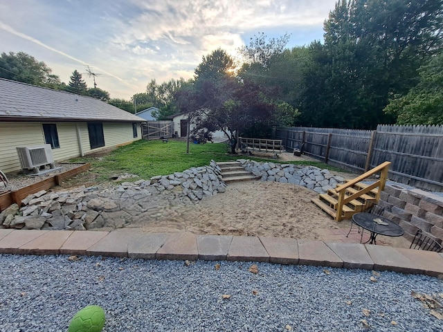 view of yard with a patio area and a fenced backyard