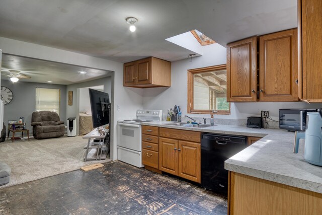 kitchen featuring black dishwasher, sink, electric range, a skylight, and ceiling fan