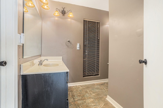 bathroom featuring tile patterned floors and vanity