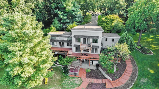 exterior space with a lawn and a deck