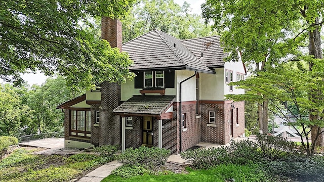 view of tudor-style house