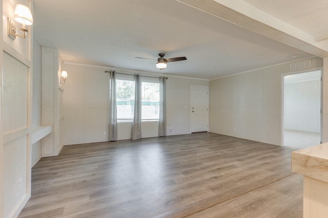 spare room with ceiling fan and light hardwood / wood-style floors