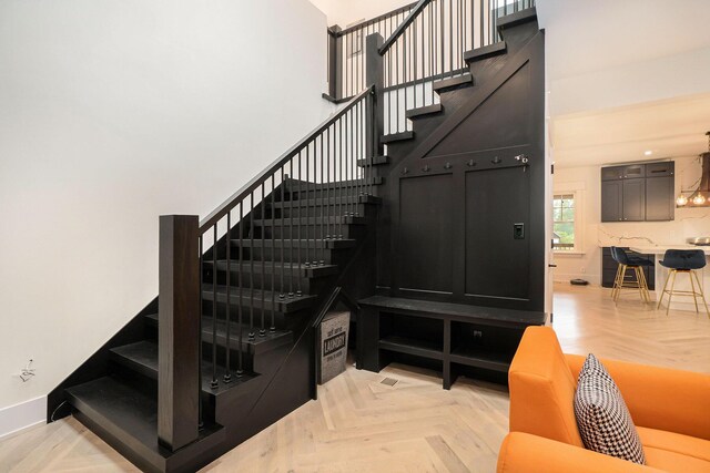 stairs with parquet flooring