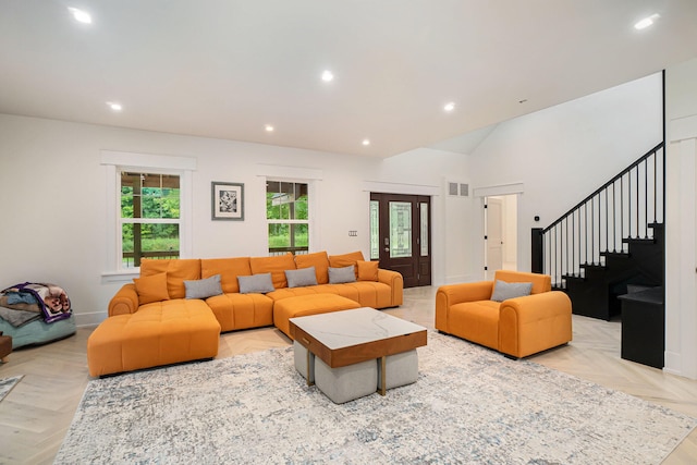 living room with light parquet floors