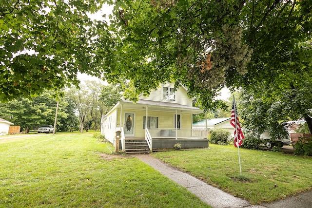 bungalow featuring a front yard and a porch