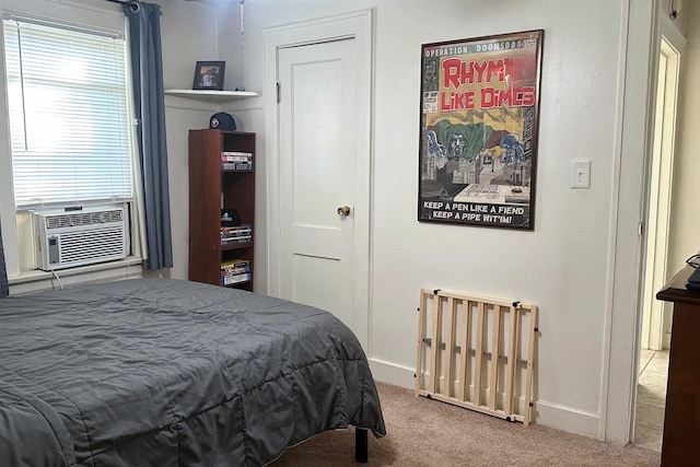 bedroom featuring light carpet and cooling unit