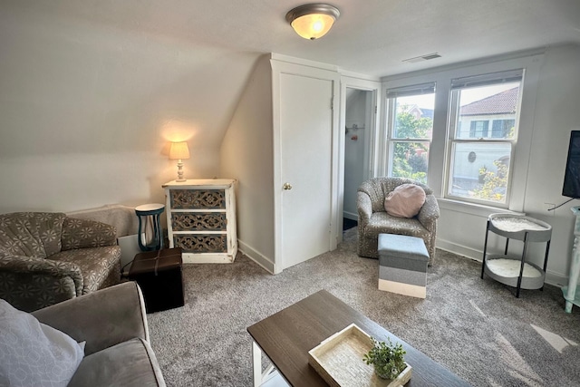 living area featuring carpet floors