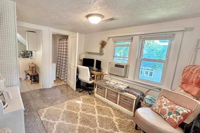 interior space with a textured ceiling and cooling unit