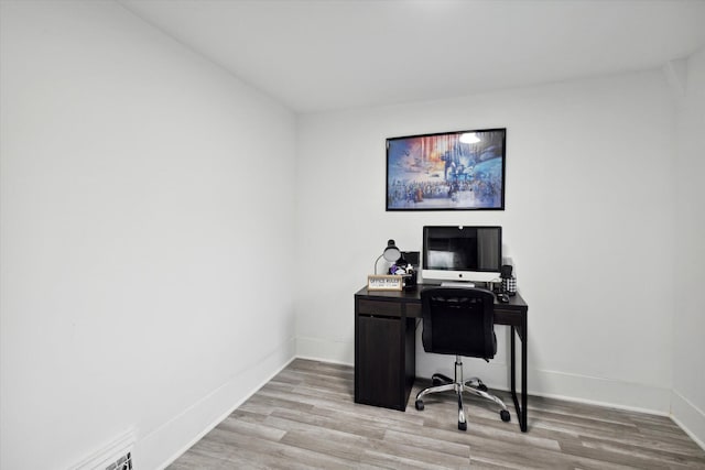 office area with light wood-type flooring