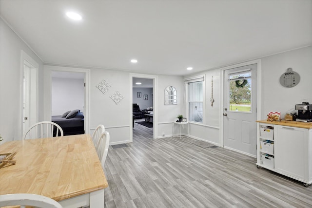 dining room with light wood-type flooring