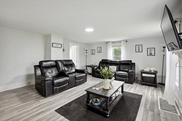 living room featuring light hardwood / wood-style floors