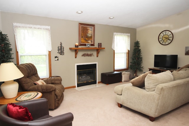 carpeted living room featuring a wealth of natural light