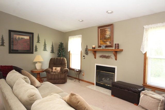 carpeted living room with lofted ceiling