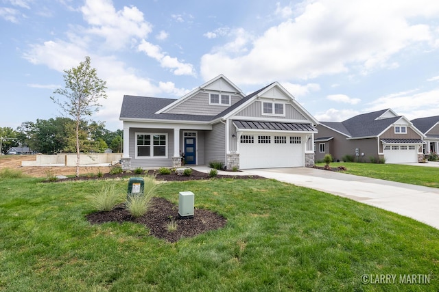 craftsman house with a standing seam roof, concrete driveway, a front lawn, a garage, and metal roof