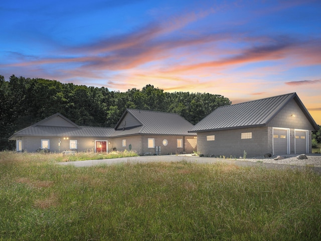 modern inspired farmhouse featuring a garage