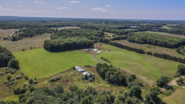 birds eye view of property featuring a rural view