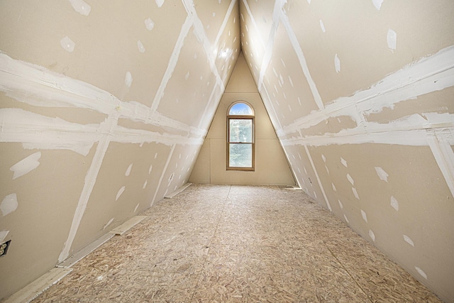 bonus room featuring lofted ceiling