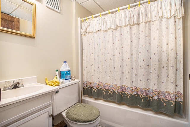 full bathroom with vanity, toilet, and shower / bath combo with shower curtain