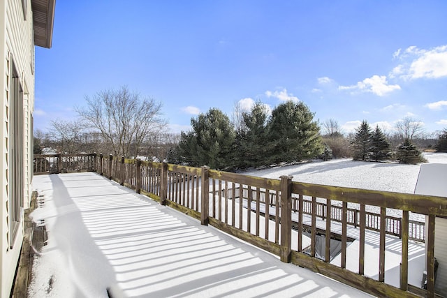 view of snow covered deck