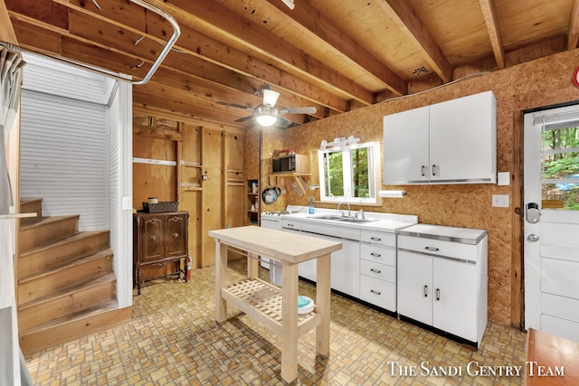 kitchen with ceiling fan, plenty of natural light, and light tile patterned floors