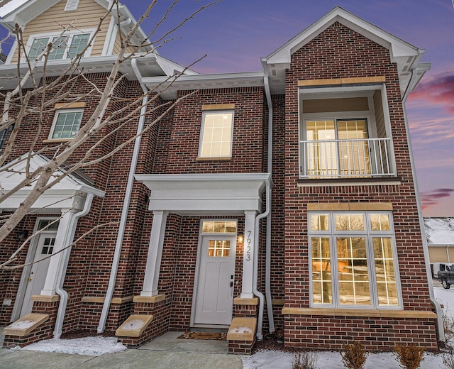 view of front of property with brick siding