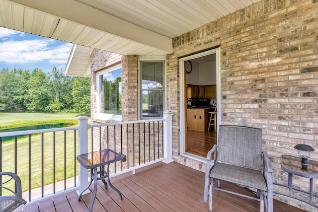 deck featuring a lawn