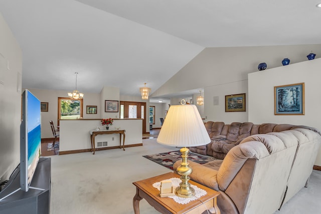 living room featuring light carpet, high vaulted ceiling, and a chandelier