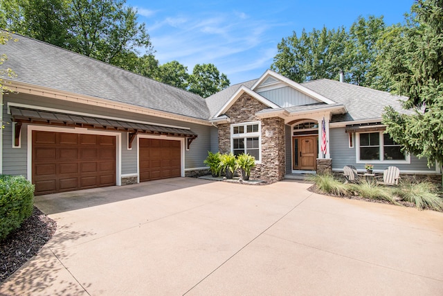 craftsman-style house with a garage