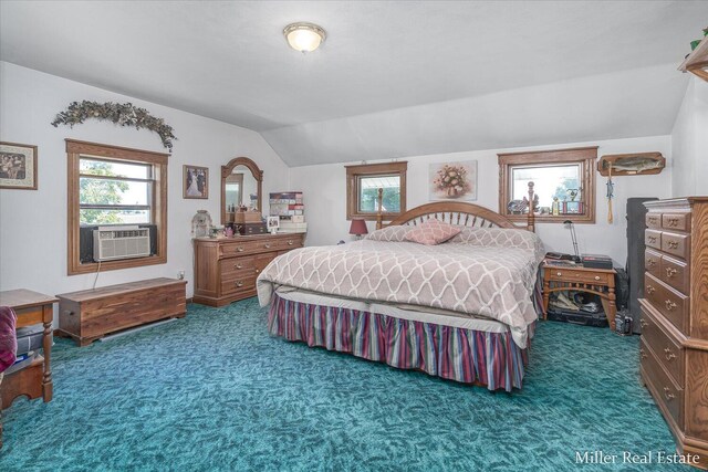 bedroom featuring vaulted ceiling, multiple windows, cooling unit, and carpet floors